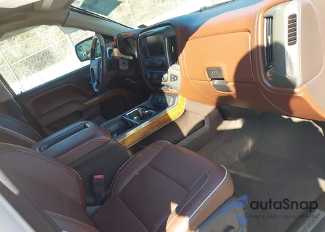 2015 Chevrolet Silverado K1500 High Country z USA, uszkodzony, nr VIN 3GCUKTEJXFG445591